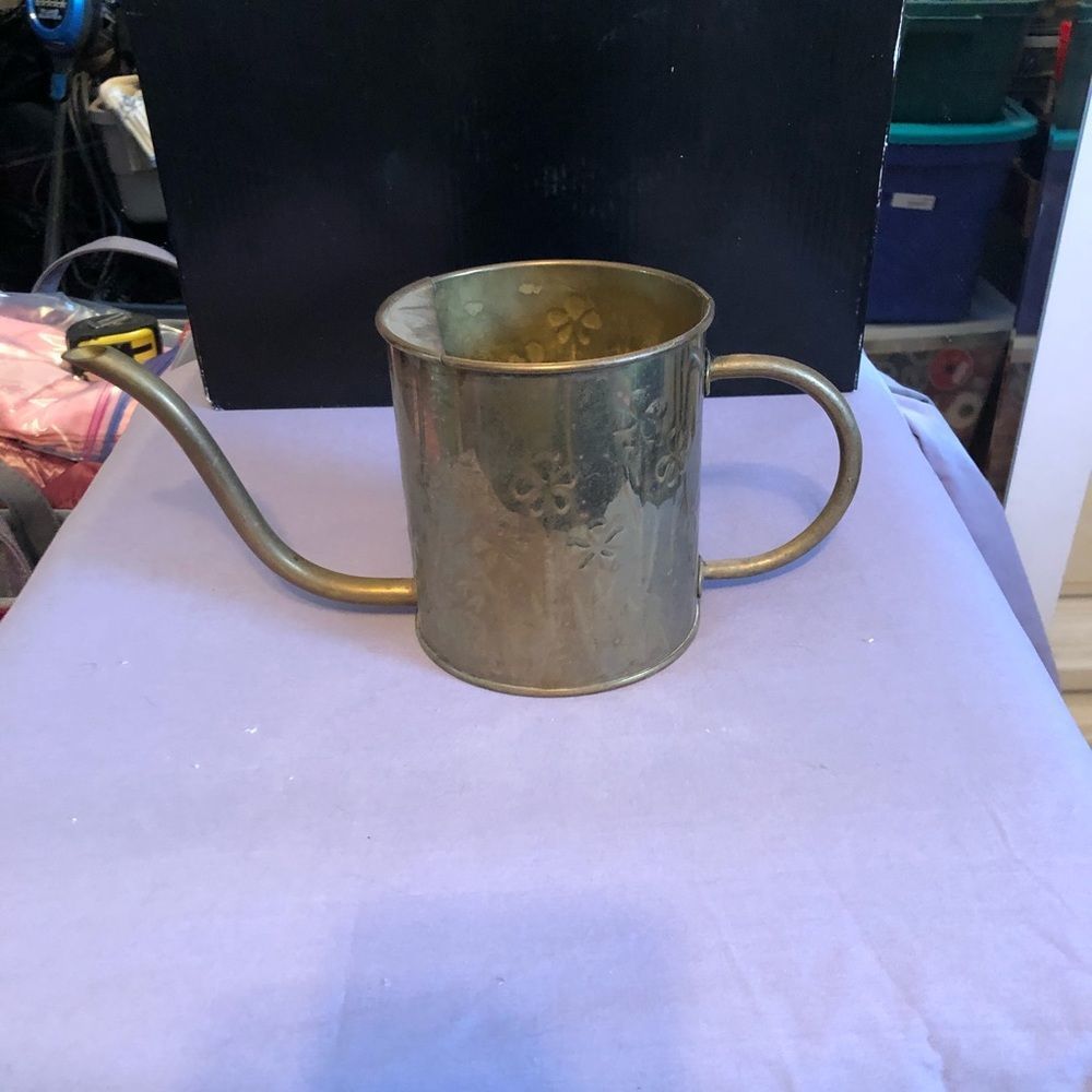 Vintage brass watering can